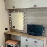 Bedroom 1 dressing table and cupboards